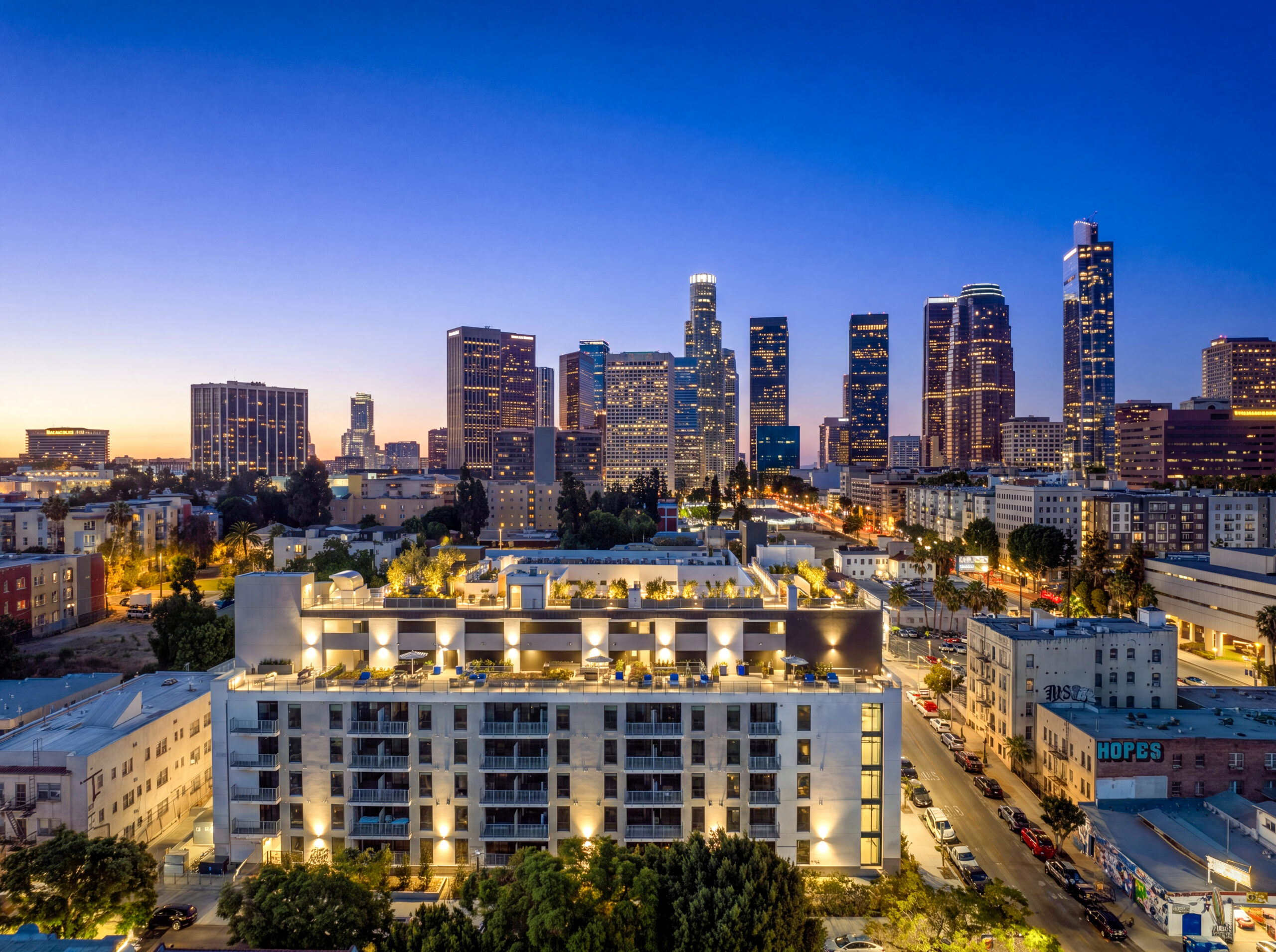 An ariel view of West 5th LA with views of Downtown Los Angeles.